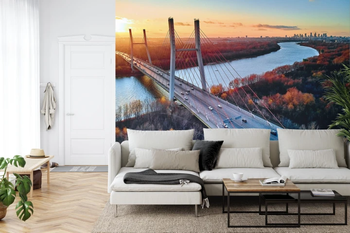 Fototapeta Beautiful Panoramic Aerial Drone View To Cable-Stayed Siekierkowski Bridge Over The Vistula River And Warsaw City Skyscrapers, Poland In Gold Red Autumn Colors In November Evening At Sunset