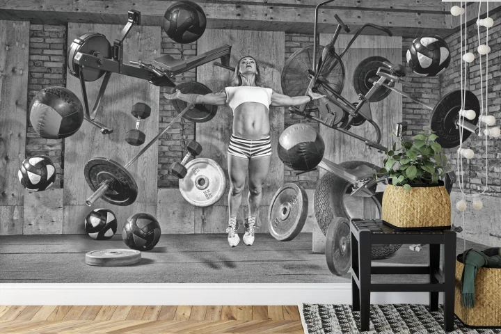 Fototapeta Kobieta Lewitująca Między Sprzętem Sportowym