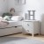 szafka nocna dla dziewczynki Collet 2 szuflady biała przy łóżku